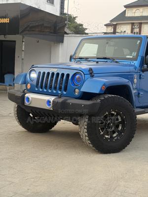 2015 Jeep Wrangler Unlimited Sahara 4dr SUV 4WD (3.6L 6cyl 6M) Blue for sale in Nigeria